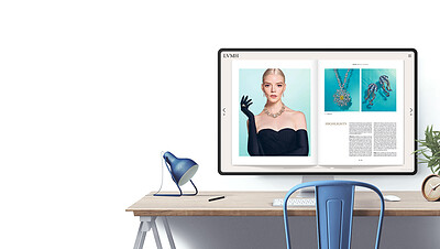 Un Fluidbook LVMH affiché sur un écran d'ordinateur posé sur un bureau